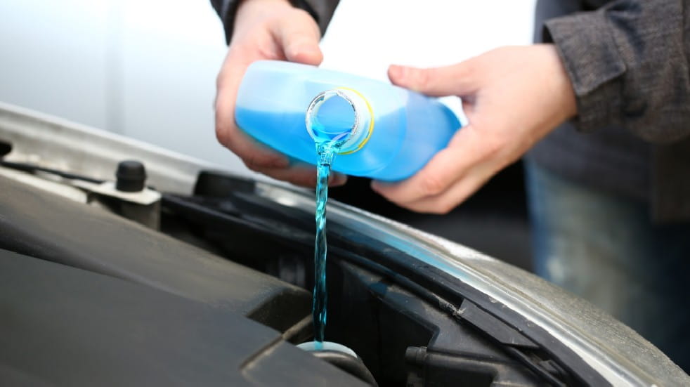 Adding coolant to car